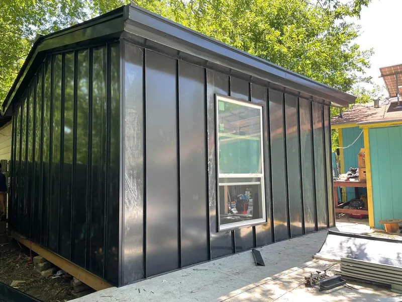 Black standing seam metal wall panels for Metal Roof Installation in Milan